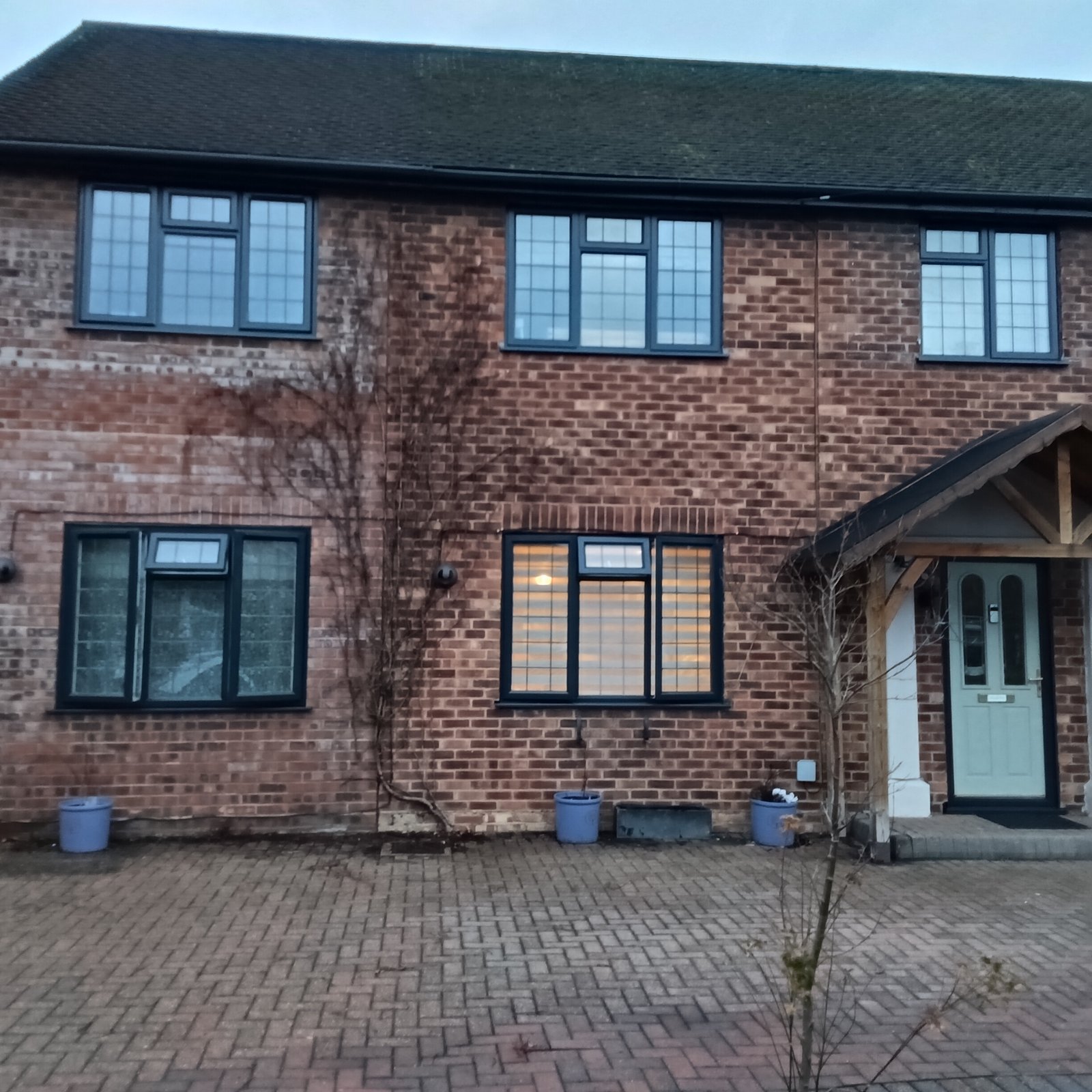 Full house UPVC spraying transformation including doors and garage in Guildford