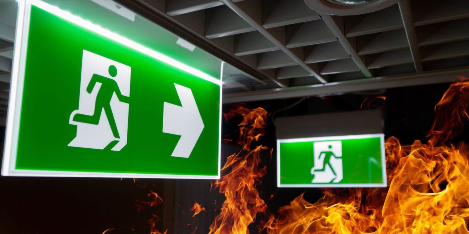 hot-flame-fire-green-fire-escape-sign-hang-ceiling-office-night